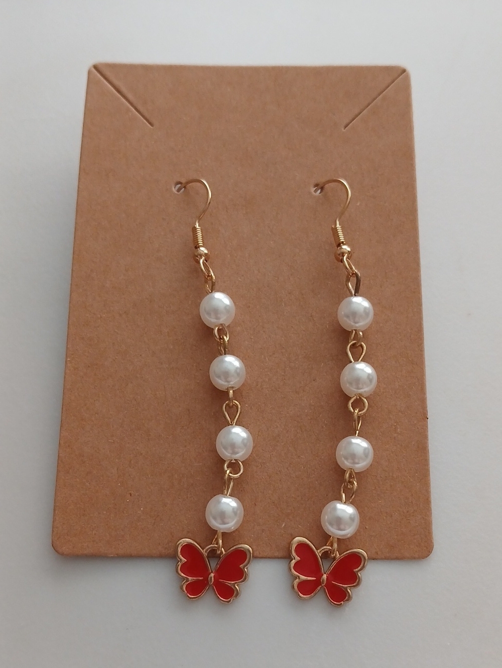 Fashion Jewelry Gold Pearl Drop Earrings with Red Butterfly Charms